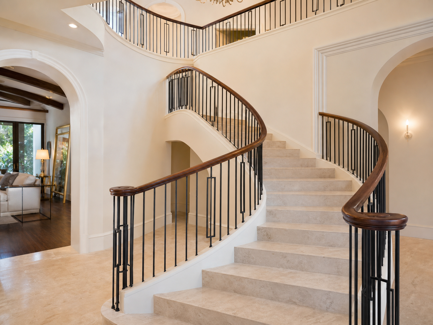Curved custom railing on grand staircase in Miami